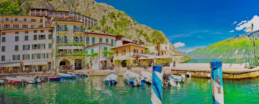 Some small boats docked in a harbour, Italy
